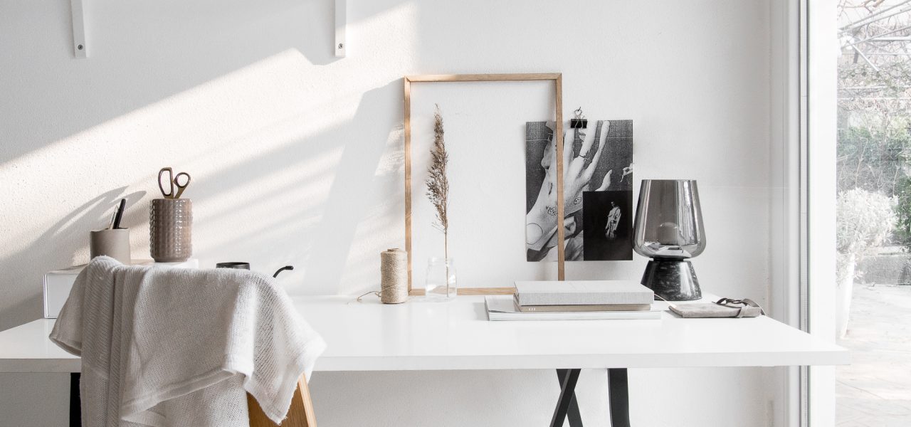 Website strategy planning on a desk with laptop and notes